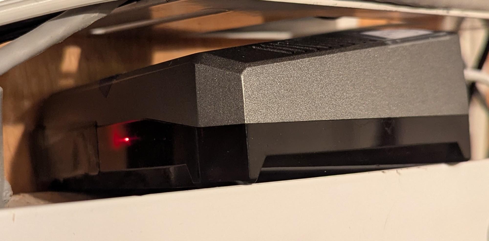 Copyparty on a Raspberry Pi 4. It's in a grey and black metal case